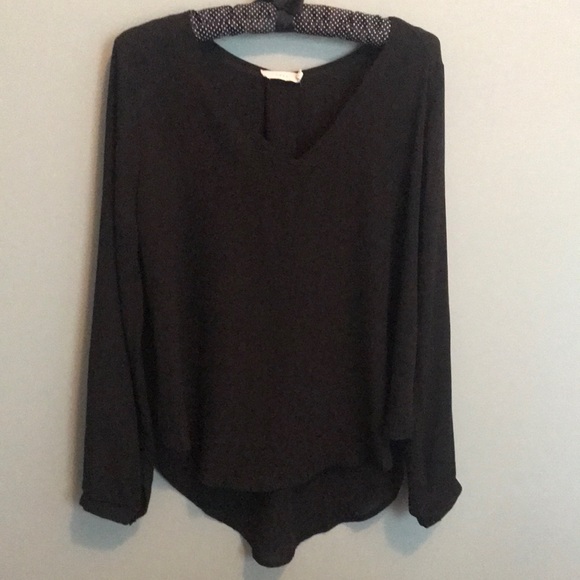 Lush black asymmetrical top with button cuff sleeves. Size: M - Picture 1 of 4